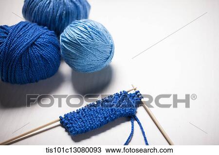 blue knit strings and stitching needles View Large Photo Image Stock Image - blue knit strings and stitching needles . Fotosearch