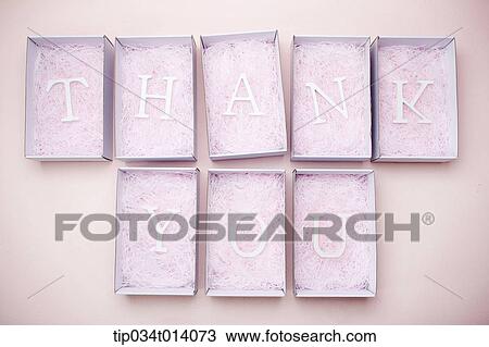 Stock Image - boxes filled with letters saying thank you. Fotosearch