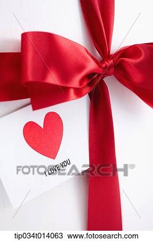 close up shot of a box with ribbon and love letter View Large Photo Image Stock Image - close up shot of a box with ribbon and love letter. Fotosearch