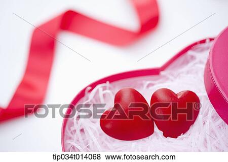 Stock Photo - close up shot of a heart box with hearts inside. Fotosearch