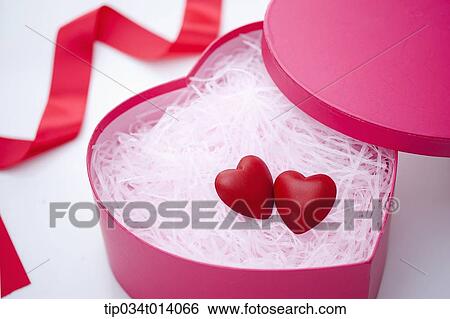 close up shot of a heart box with hearts inside View Large Photo Image Stock Photograph - close up shot of a heart box with hearts inside. Fotosearch