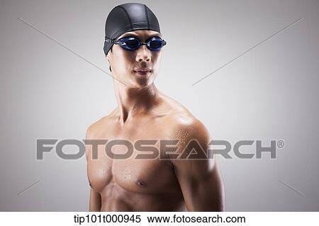 close up shot of a man with swimming goggle and hat View Large Photo Image Stock Photography - close up shot of a man with swimming goggle and hat. Fotosearch