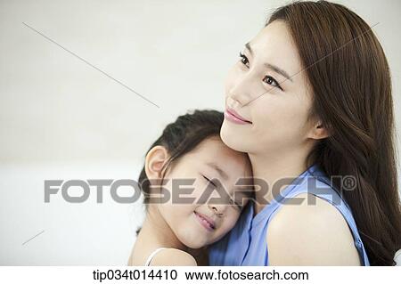 close up shot of a mother and daughter View Large Photo Image Stock Image - close up shot of a mother and daughter. Fotosearch