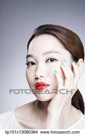 close up shot of a woman in red lipsticks View Large Photo Image Picture - close up shot of a woman in red lipsticks. Fotosearch