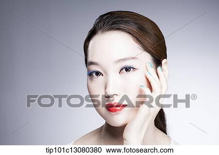 close up shot of a woman in red lipsticks View Large Photo Image Stock Image - close up shot of a woman in red lipsticks. Fotosearch