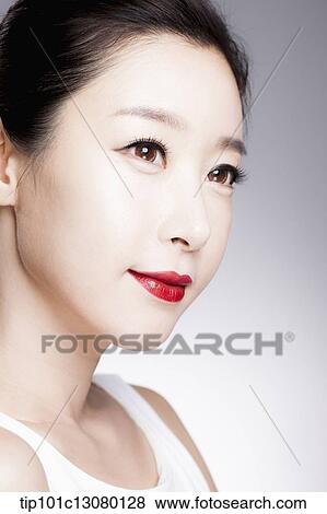 close up shot of a woman in red lipsticks and white top View Large Photo Image Stock Photo - close up shot of a woman in red lipsticks and white top. Fotosearch