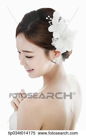 Stock Photography - close up shot of a woman in wedding hair. Fotosearch