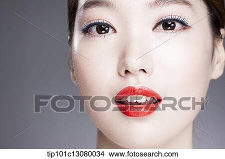 close up shot of a woman with red lipstick View Large Photo Image Picture - close up shot of a woman with red lipstick. Fotosearch
