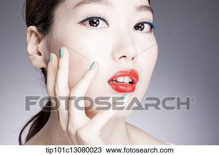 close up shot of a woman with red lipstick View Large Photo Image Stock Image - close up shot of a woman with red lipstick. Fotosearch