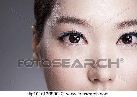 Stock Image - close up shot of a woman's face. Fotosearch