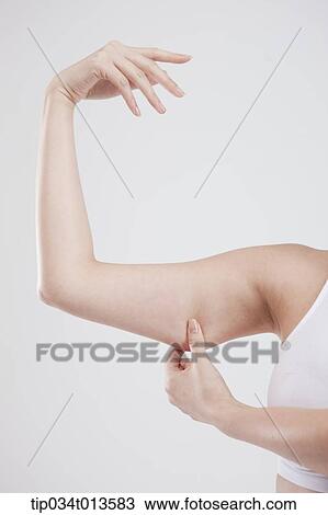 close up shot of fat on women's arm View Large Photo Image Stock Image - close up shot of fat on women's arm. Fotosearch