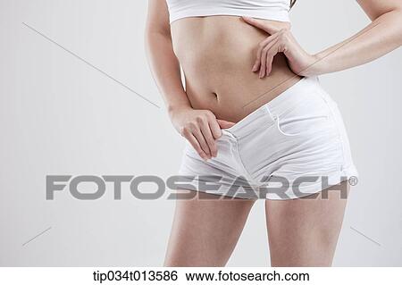 Stock Photograph - close up shot of healthy woman's body. Fotosearch