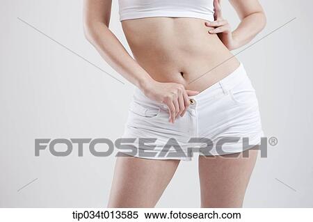 Stock Photography - close up shot of healthy woman's body. Fotosearch