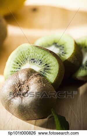 Stock Photograph - close up shot of kiwi fruits. Fotosearch