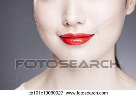 Stock Photo - close up shot of lips of a woman. Fotosearch