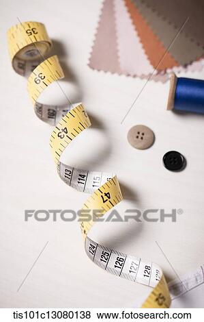 close up shot of measurement tap with sample clothes View Large Photo Image Stock Photo - close up shot of measurement tap with sample clothes. Fotosearch