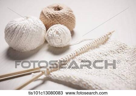 Stock Image - close up shot of white knit stiches . Fotosearch