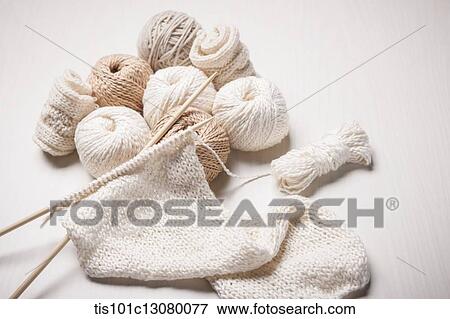 Stock Photo - close up shot of white knit stiches . Fotosearch