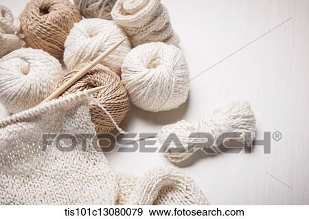 Stock Photo - close up shot of white knit stiches . Fotosearch