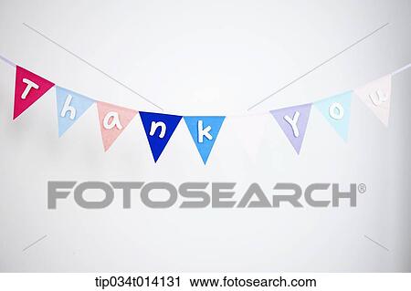 Stock Image - flags hanging in the string saying thank you . Fotosearch
