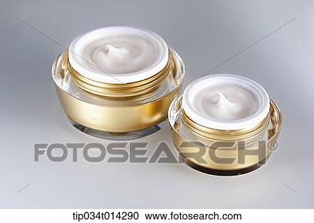 golden make up cases in grey background View Large Photo Image Stock Image - golden make up cases in grey background . Fotosearch