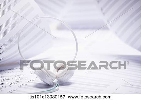 headset on musical papers View Large Photo Image Stock Photo - headset on musical papers . Fotosearch