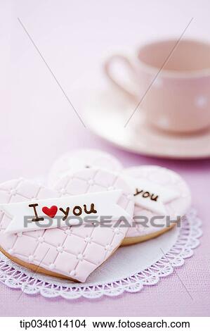 heart shape cookies and cup of coffee View Large Photo Image Picture - heart shape cookies and cup of coffee. Fotosearch