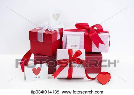 Stock Photography - I love you note with gift boxes. Fotosearch
