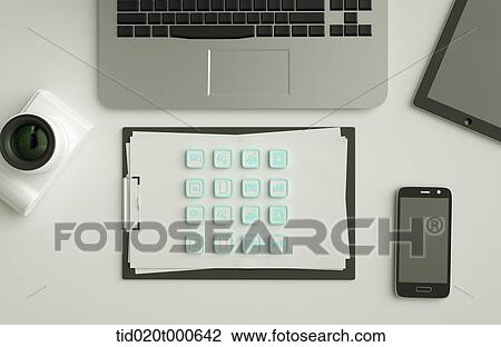 Stock Image - icons on a note paper next to a laptop. Fotosearch