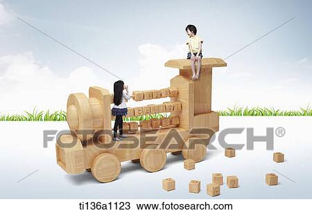 Stock Image - kids around a toy vehicle. Fotosearch