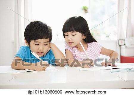 kids at desk learning together View Large Photo Image Stock Image - kids at desk learning together. Fotosearch