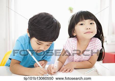 kids at desk learning together View Large Photo Image Stock Image - kids at desk learning together. Fotosearch