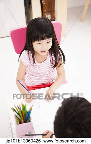 kids drawing on a sketchbooks View Large Photo Image Stock Photograph - kids drawing on a sketchbooks. Fotosearch