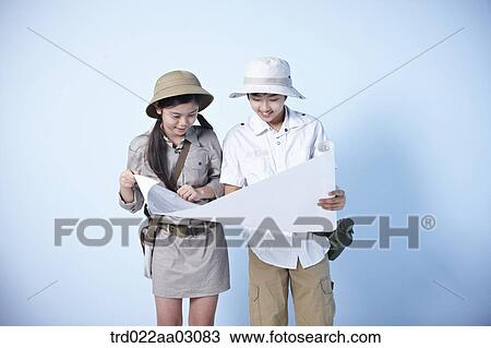 kids dressed as explorers while looking at a map View Large Photo Image Stock Image - kids dressed as explorers while looking at a map. Fotosearch