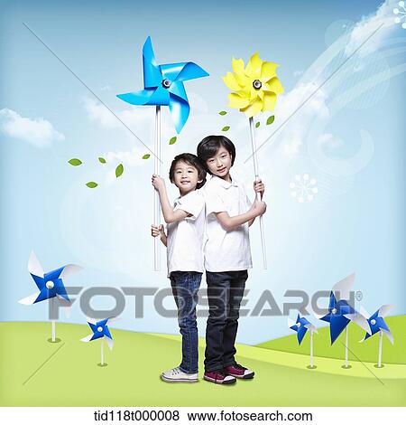 kids holding paper pinwheel View Large Photo Image Stock Photo - kids holding paper pinwheel. Fotosearch
