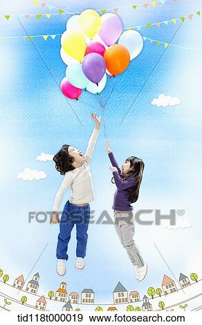 kids jumping with bunch of balloons View Large Photo Image Stock Photo - kids jumping with bunch of balloons. Fotosearch