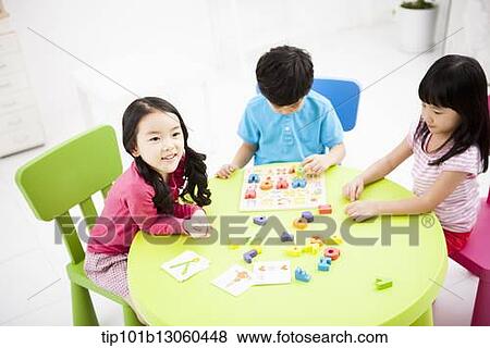 kids learning with toys at table View Large Photo Image Stock Photo - kids learning with toys at table. Fotosearch