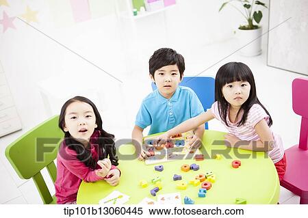 kids learning with toys at table View Large Photo Image Stock Photography - kids learning with toys at table. Fotosearch
