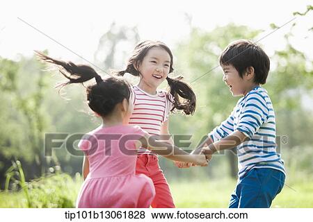 kids playing in the nature View Large Photo Image Stock Photo - kids playing in the nature. Fotosearch
