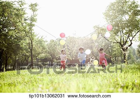 kids playing with balloons View Large Photo Image Stock Image - kids playing with balloons. Fotosearch