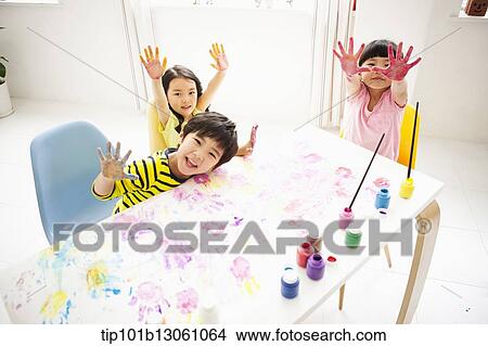 kids playing with finger colors View Large Photo Image Picture - kids playing with finger colors. Fotosearch