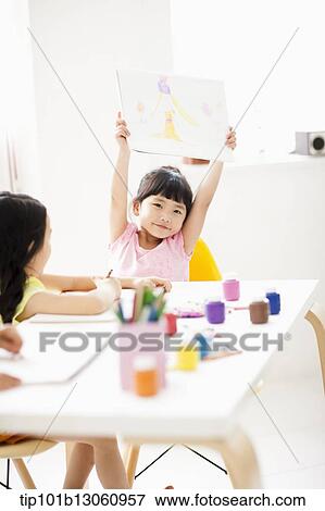 Stock Photo - kids playing with finger colors. Fotosearch