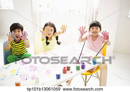 kids playing with finger colors View Large Photo Image Stock Photo - kids playing with finger colors. Fotosearch