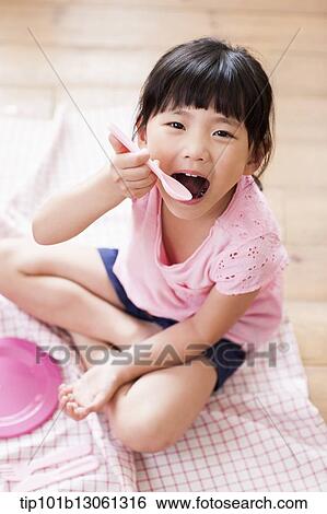 Stock Photograph - kids playing with toy dishes. Fotosearch