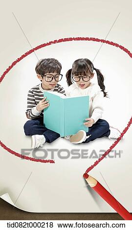 kids reading a book together View Large Photo Image Stock Photo - kids reading a book together. Fotosearch