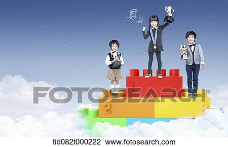 kids standing on a Lego podium View Large Photo Image Stock Image - kids standing on a Lego podium. Fotosearch