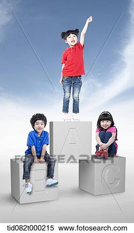 kids standing on blocks View Large Photo Image Stock Photography - kids standing on blocks. Fotosearch