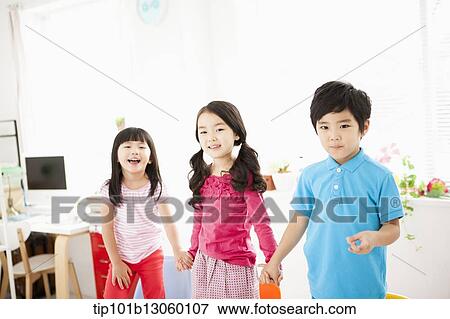 kids standing on chairs View Large Photo Image Stock Photo - kids standing on chairs. Fotosearch