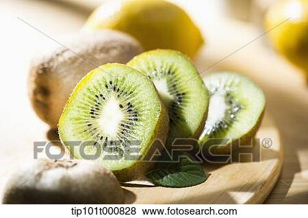 kiwi fruits and lemons on the wooden floor View Large Photo Image Stock Photo - kiwi fruits and lemons on the wooden floor. Fotosearch