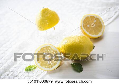 lemons on a white cloth View Large Photo Image Stock Photo - lemons on a white cloth. Fotosearch